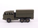 a toy army truck with a trailer on a white surface