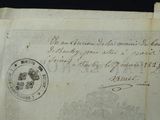 a close up of a piece of paper with a stamp on it