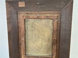 a picture of an easel with a painting on it