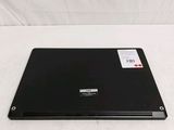 the back of a laptop computer sitting on top of a white surface