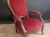 an old chair with red upholstered upholstered upholstered upholstered upholstered upholstered upholstered upholstered upholstered