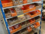 many boxes of assorted items on the shelves