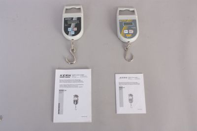 two tags attached to the back of two electronic devices