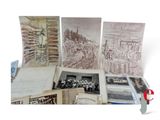a lot of old photos and a pair of scissors