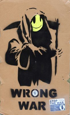 a sticker on a cardboard box with a drawing of a person holding a scyther