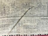 a close up of a piece of cloth with writing on it