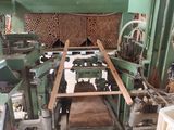 an image of a machine that is working on a piece of wood