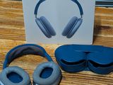a box with a pair of headphones and a pair of blindfolds next to it