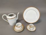 two cups and a saucer on the table