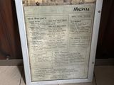 a picture of a menu on the floor of a restaurant
