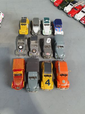 a lot of toy cars that are sitting on the floor