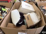a box full of shoes and other items in it