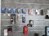 a picture of a work area with tools on the wall
