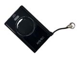 a black electronic device with a keychain attached to it