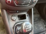 a close up of a car ' s gear knob and dashboard