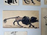several drawings of cats and dogs are hanging on a wall