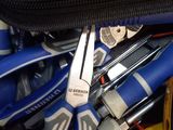 a close up of a bunch of tools in a bag