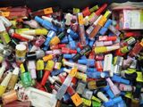 a bin full of assorted cosmetics and beauty products