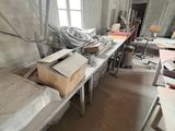 a room that has a bunch of boxes on the table