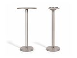 a pair of metal candlesticks on a white background