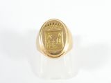 an image of a gold signet ring with a coat of arms on it