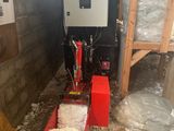 une image d'une machine qui se trouve dans une pièce