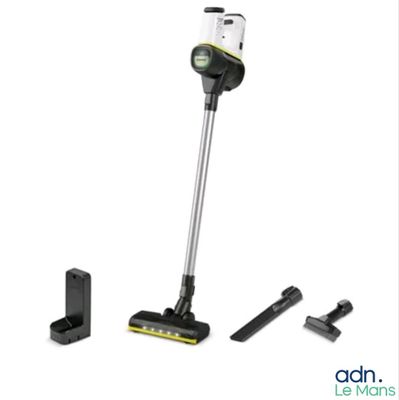a black and white photo of a cordless vacuum cleaner