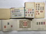 a lot of different stamps on the pages of a book