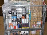 a metal cart with many items in it in a warehouse