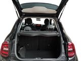 the back of a car with the trunk open and the seats down