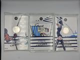 three coin sets with a picture of a hockey player on them