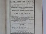 an open book on a white table with a black and white title