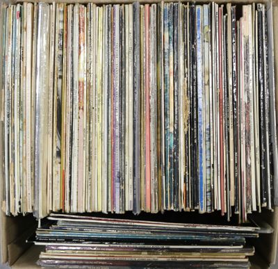 a box full of old records sitting on top of a table