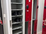 two red lockers that are next to each other in a room