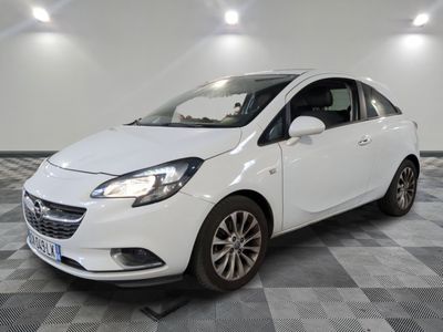 a picture of a white car parked in a garage