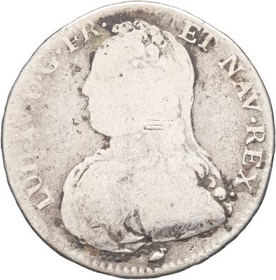 gros plan d'une pièce de monnaie sur fond blanc