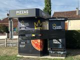 a vending machine on the side of the road