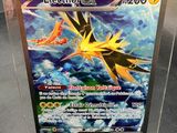 a close up of a box of pokemon cards on a table