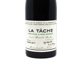 a bottle of wine that is sitting on a table
