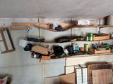 a room that has a lot of clutter on the wall