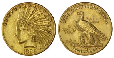 Gros plan sur une pièce d'or ornée d'un aigle