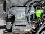 a close up view of a car ' s engine and its wiring