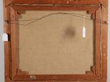 an old picture frame with a picture hanging on a wall