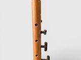 an image of a close up of a wooden instrument on a white background
