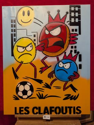 une peinture représentant des « Angry Birds » et un ballon de football, exposée dans une boutique