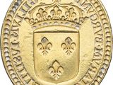 une pièce d'or surmontée d'une couronne