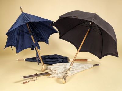 two umbrellas sitting next to each other on a table