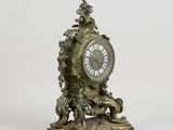 a clock that is sitting on top of a table