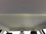 the back of a car with a rear view mirror and a camera attached to the back of the car