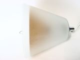 a white lamp that is sitting on a table